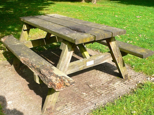 rotten wooden picnic table bench